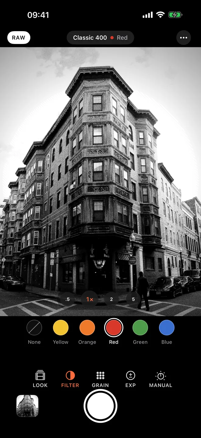 B&W Camera with the red filter selected, darkening the sky behind a brick building